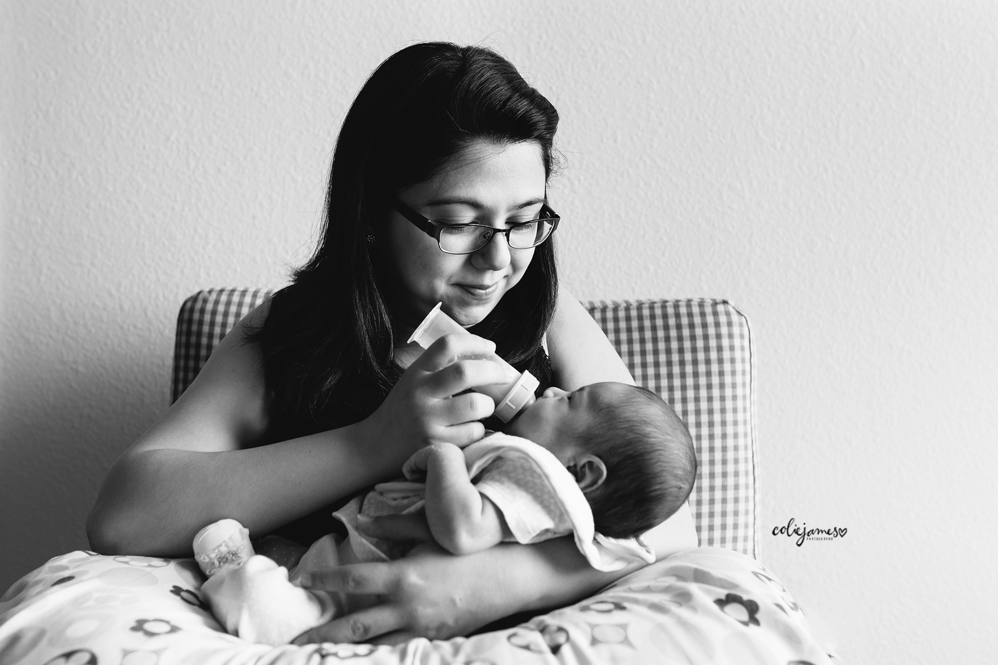 feed the baby colie james preparing newborn session
