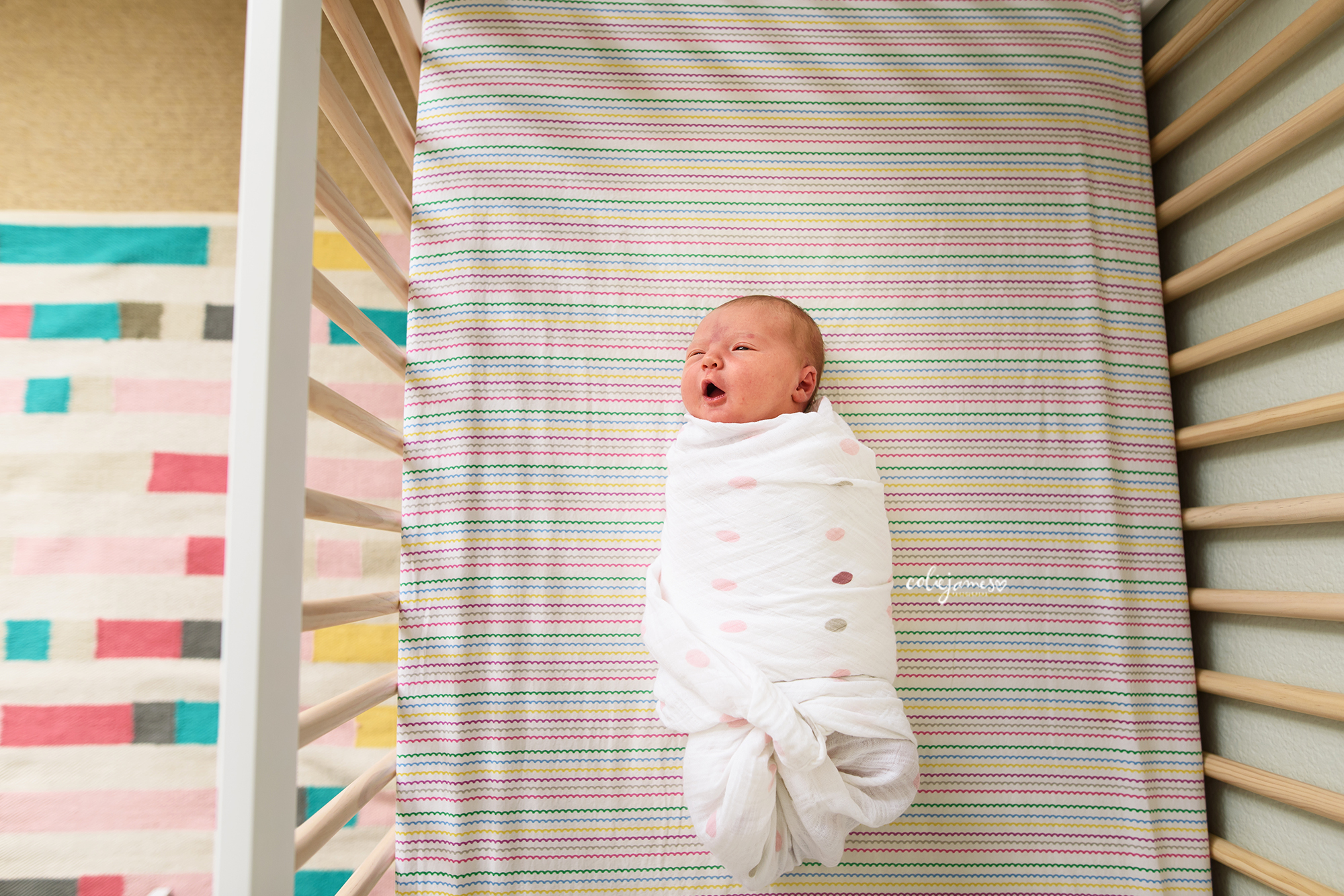 lifestyle newborn photography in the crib colie james