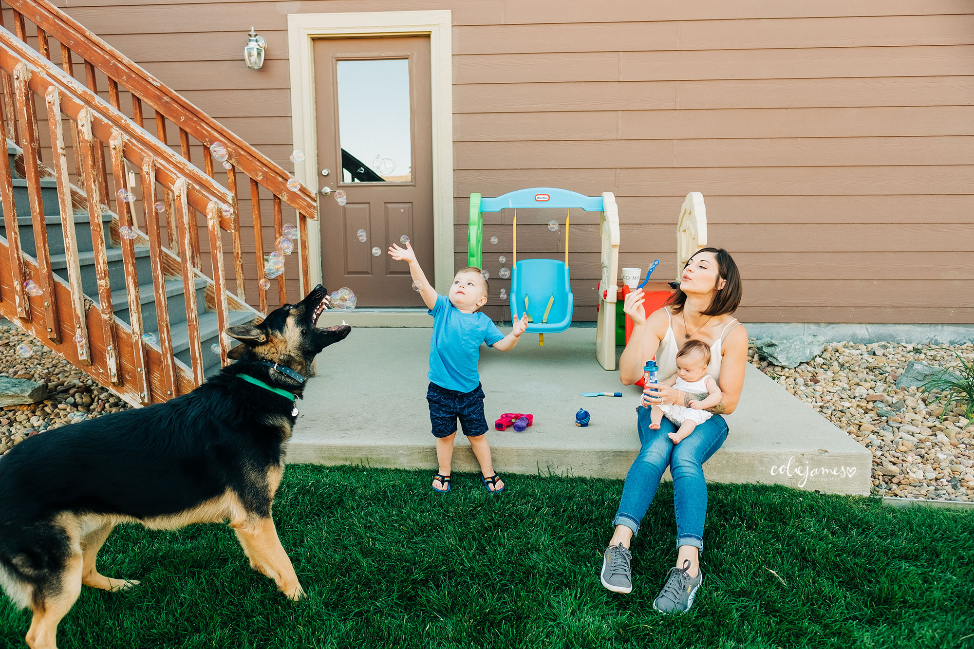 Thornton family photographer, Thornton newborn photographer, at-home family photography, playing with bubbles, backyard adventures