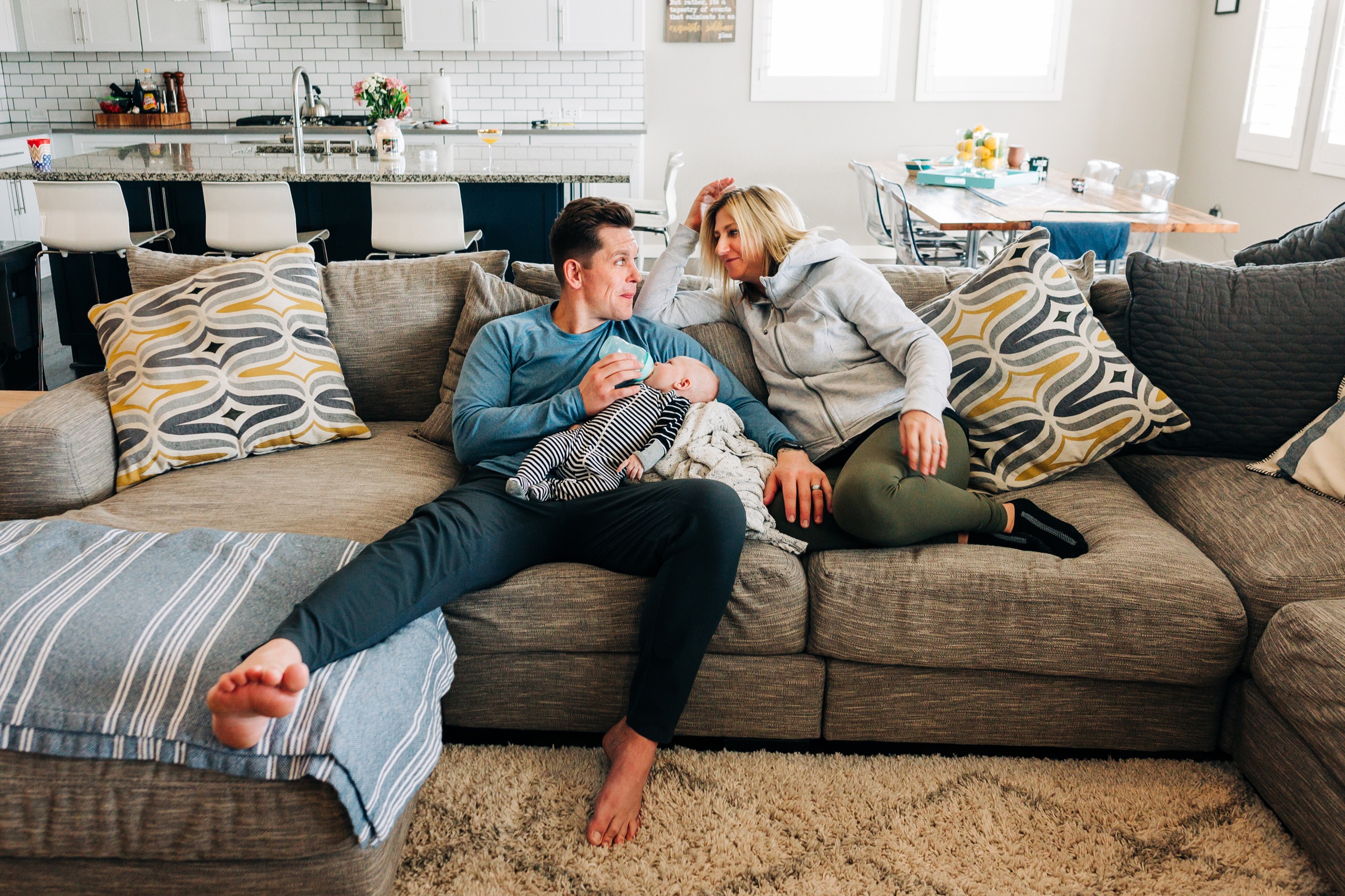 parker colorado newborn photographer, parents on couch